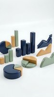 Abstract geometric shapes in navy blue, sage green and orange representing data visualization charts and graphs on white background for business presentations.