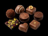 Assorted luxury chocolates and pralines isolated on transparent background, ready for confectionery menus, stickers, print on demand, T-shirt designs, and clipart use.