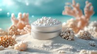 White cosmetic cream jar with pearls on sandy beach background with coral decorations and soft turquoise bokeh lights creating spa atmosphere.