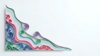 Colorful paper quilling art corner border with spiral swirls in rainbow hues on white background for crafting and decorative design projects.