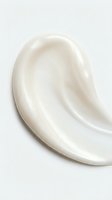 White cream lotion smear texture on clean background for skincare cosmetic product advertising and beauty industry marketing materials.