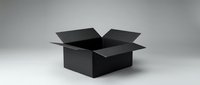Empty black cardboard box open on white background isolated for packaging design and shipping concepts.