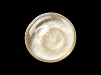 Creamy beige cosmetic product swirl with texture, isolated on transparent background. Ready for beauty, skincare, and cosmetics design projects including packaging, print-on-demand, and digital marketing materials.
