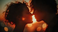 Romantic couple silhouettes kissing at golden sunset with warm bokeh lights creating intimate atmosphere for love and relationship concepts.