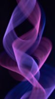 Abstract purple and blue smoke swirls creating elegant flowing patterns against black background for modern digital art and creative design projects.