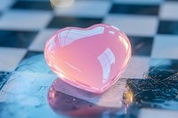 Pink glass heart on checkered surface with soft lighting and reflections creates romantic mood. Water droplets add dreamy atmosphere to love concept piece.