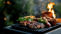Juicy grilled meat and vegetables on black grill pan with smoke and fire in background, atmospheric evening barbecue setting with bokeh lights.