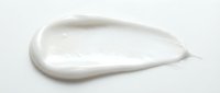Smooth white cream or lotion smear isolated on white background, ready for cosmetic, skincare, and beauty product design applications.