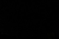 Dark night sky filled with countless bright stars creating natural celestial backdrop for astronomy and space exploration projects.