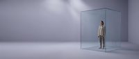 Young businessman trapped inside transparent glass box in minimalist purple studio space representing isolation, confinement and business limitations.
