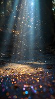Magical glowing particles and bokeh lights floating in dark blue atmosphere with bright sparkles and light beams creating ethereal dreamy background effect.