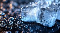 Melting ice cubes with water drops on dark reflective surface, macro photography showing crystal clear frozen blocks with bokeh light effects in blue tones.
