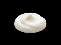 Creamy white whipped topping or sour cream dollop isolated on transparent background, ready for food packaging, recipe graphics, and culinary design projects.