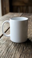 White ceramic coffee mug on rustic wooden table surface with warm natural lighting for morning beverage and cafe branding mockup designs.