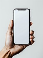 Modern smartphone with blank white screen held in dark-skinned male hand against light background, mockup ready for app or website design presentation.
