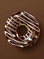 Chocolate glazed donut with white icing drizzle on brown background, appetizing sweet pastry for bakery menu or dessert advertising.