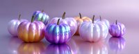 Decorative holographic pumpkins in pastel pink, purple, and iridescent colors arranged in row on reflective surface against soft purple background.