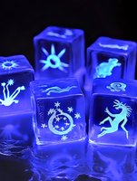 Glowing blue ice cubes with mystical symbols and magical creatures carved into transparent surfaces create enchanting light effects against dark background.