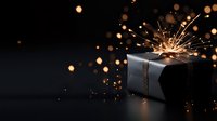 Festive gift box with burning sparkler creating magical light trails and bokeh effects against dark background, holiday celebration concept.