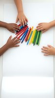 Children hands reaching for colorful pencils on white background promoting creativity and artistic expression in educational settings.
