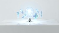 Healthcare innovation lightbulb with medical icons floating around representing digital health technology and telemedicine solutions for modern medicine.