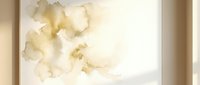 Abstract watercolor background with soft beige and cream tones flowing organically across canvas creating elegant artistic texture for design projects.
