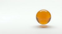 Golden amber sphere with glossy finish isolated on white background, suitable for skincare product packaging, cosmetics branding, and wellness design projects.