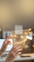 Hand holding transparent digital tablet with golden glowing particles and light effects, displaying futuristic technology interface for business, innovation, and digital transformation concepts.