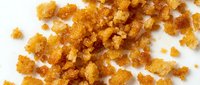 Crispy golden fried chicken pieces scattered on white background, ready for food packaging, menu design, restaurant marketing, and culinary content creation.