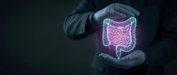 Medical professional protecting glowing digestive system hologram with hands showing intestinal health care and gastroenterology concept.