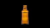 Amber glass dropper bottle isolated on transparent background, ready for design use in packaging mockups, product labels, sublimation, print-on-demand, and digital crafts.
