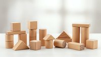 Natural wooden building blocks set with geometric shapes including cubes, cylinders, triangles and rectangles arranged on white surface for educational play.