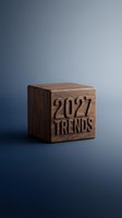 Wooden cube with 2027 trends engraved text on gradient blue background for business forecasting and future planning concepts.