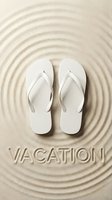 White flip flops on rippled sand with the word vacation carved below, evoking summer travel and beach relaxation.