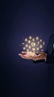 Businessman holding glowing alphabet letters and globe symbol in cupped hands against dark blue background, representing language learning, communication, global business, and digital knowledge.