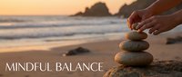 Hands carefully stacking smooth stones on beach sand during golden sunset, creating zen balance tower for meditation and mindfulness practice by ocean waves.