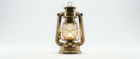 Vintage brass oil lantern with glowing warm light inside, isolated on white background. Suitable for antique, retro, and nostalgic design projects.