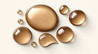 Glossy golden liquid drops on beige background, cosmetic serum or oil essence for skincare products and luxury beauty advertising.