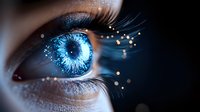 Glowing blue eye with magical sparkles and light particles against dark background, macro photography showing detailed iris texture and eyelashes.