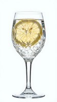 Crystal wine glass filled with sparkling water and fresh lemon slice, isolated on white background, perfect for beverage, hospitality and refreshment design projects.