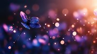 Glowing blue butterfly with sparkling wings against dreamy bokeh background with warm orange and purple light effects creating magical atmosphere.
