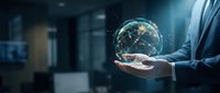 Businessman holding glowing digital globe with network connections in modern office environment representing global business technology and connectivity.