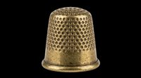 Vintage brass sewing thimble isolated on transparent background, ready for crafting clipart, stickers, print on demand, sublimation, and t-shirt design use.