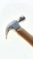 Claw hammer with wooden handle isolated on white background, suitable for construction, carpentry, and DIY projects.