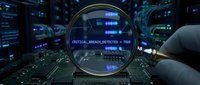 Magnifying glass revealing critical breach detected alert on computer circuit board with digital code and data streams in dark tech environment.