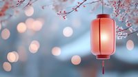 Glowing coral paper lantern among cherry blossom branches with soft bokeh lights creating magical Asian atmosphere for celebration and festive design.