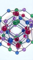 Colorful molecular structure with translucent spheres in blue, green, purple, and magenta connected by metallic rods on white background. Suitable for science, chemistry, and educational materials.