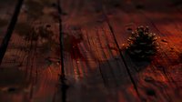 Pine cone on dark wooden planks illuminated by warm reddish light creating moody atmospheric composition with dramatic shadows and rustic texture.