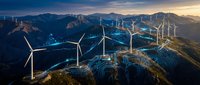 Renewable energy landscape with wind turbines and solar panels on mountain terrain at sunset showcasing sustainable power generation technology.
