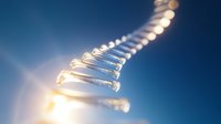 Glowing DNA double helix structure with illuminated strands against blue background, representing genetic research, biotechnology, and scientific innovation.